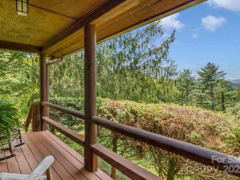 85 Rock Rest Road, Hendersonville, NC 28739.  MLS# CAR4282137, YatesRealty ID 33979. Sit and rock awhile - and take in the views!
