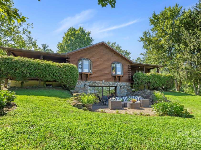 85 Rock Rest Road, Hendersonville, NC 28739.  MLS# CAR4282137, YatesRealty ID 33979. Sunny patio