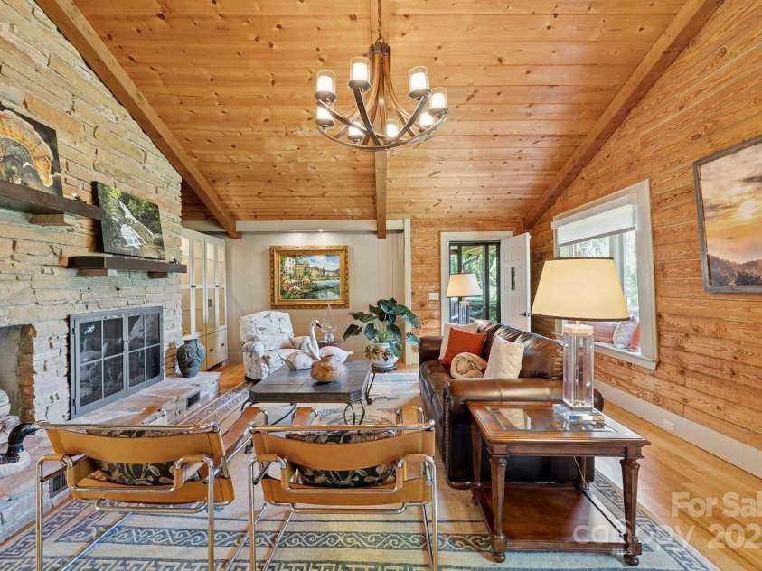 85 Rock Rest Road, Hendersonville, NC 28739.  MLS# CAR4282137, YatesRealty ID 33979. Warm and inviting living room
