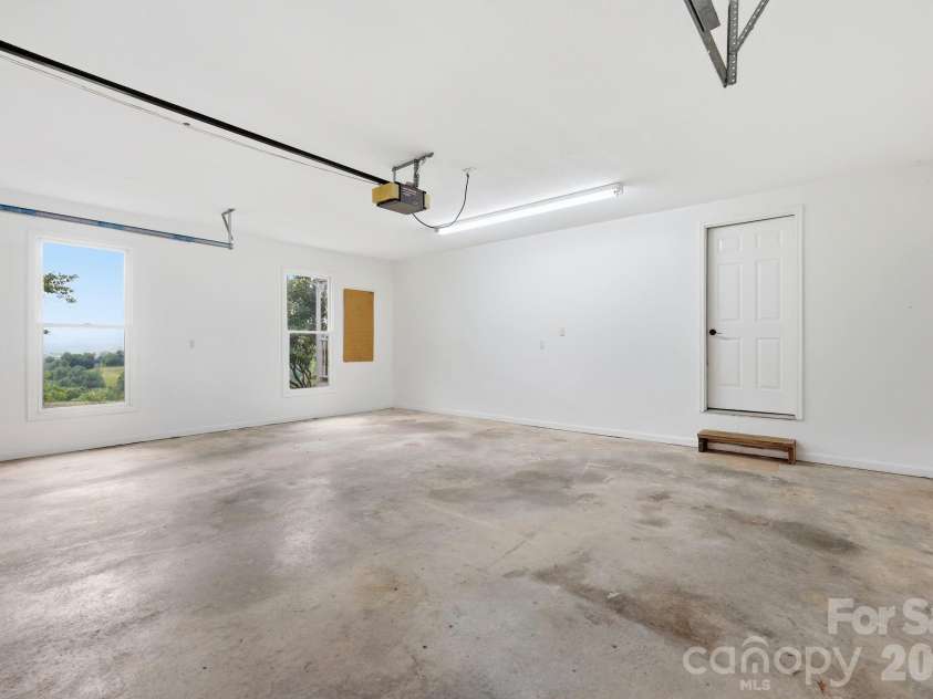 1091 WINDSWEPT RIDGE Road, Marshall, NC 28753.  MLS# CAR4393811, YatesRealty ID 33980. 2 Car Garage