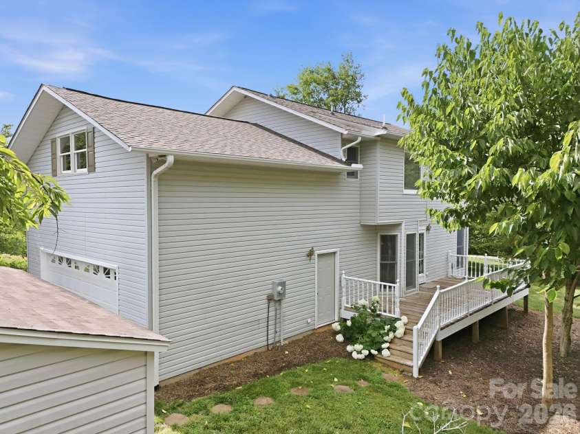 1091 WINDSWEPT RIDGE Road, Marshall, NC 28753.  MLS# CAR4393811, YatesRealty ID 33980. Back Deck entry & side entry to Garage