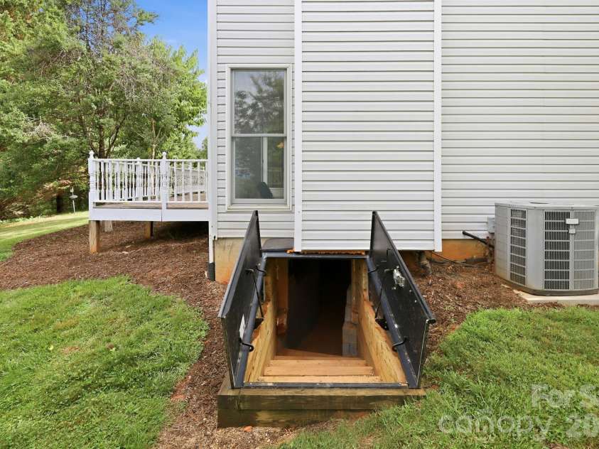 1091 WINDSWEPT RIDGE Road, Marshall, NC 28753.  MLS# CAR4393811, YatesRealty ID 33980. Entry to Mechanical area/basement