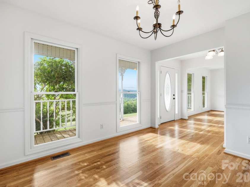 1091 WINDSWEPT RIDGE Road, Marshall, NC 28753.  MLS# CAR4393811, YatesRealty ID 33980. From DR, Looking back to front entry