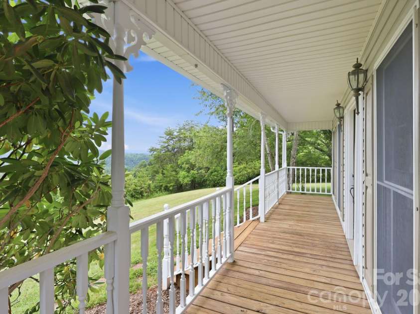 1091 WINDSWEPT RIDGE Road, Marshall, NC 28753.  MLS# CAR4393811, YatesRealty ID 33980. Rocking Chair Front Porch w/VIEWS GALORE! 