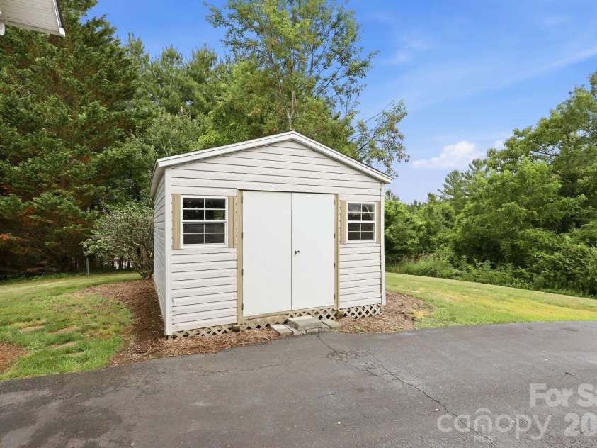 1091 WINDSWEPT RIDGE Road, Marshall, NC 28753.  MLS# CAR4393811, YatesRealty ID 33980. Storage/ Workshop w/ electric service