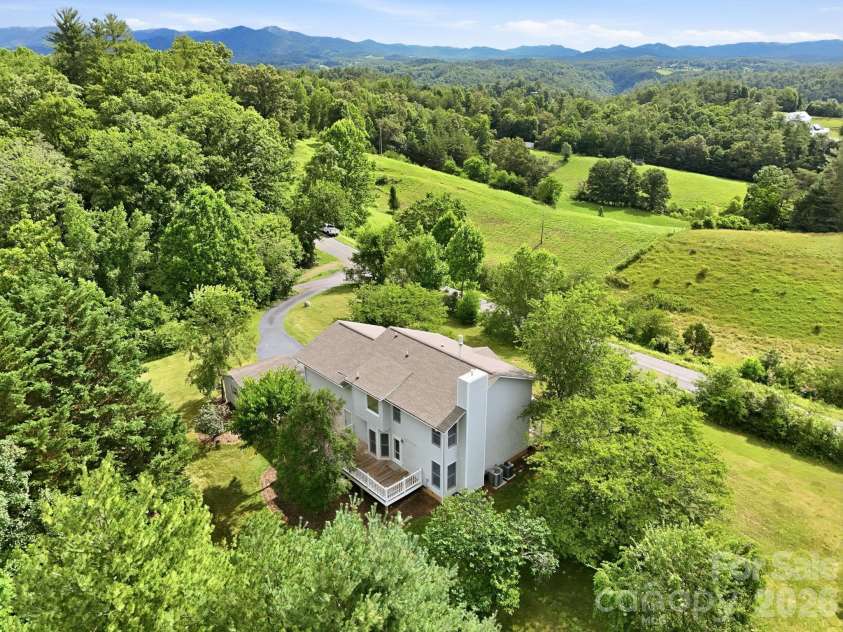1091 WINDSWEPT RIDGE Road, Marshall, NC 28753.  MLS# CAR4393811, YatesRealty ID 33980. Surrounded by mountain ranges