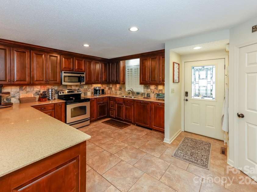 130 Edwards Point, Lake Lure, NC 28746.  MLS# CAR4292102, YatesRealty ID 33985. 