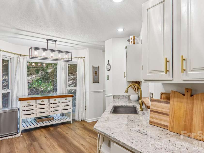 401 Heather Marie Drive, Hendersonville, NC 28792.  MLS# CAR4398616, YatesRealty ID 33985. Large Windows for plenty of Natural Light