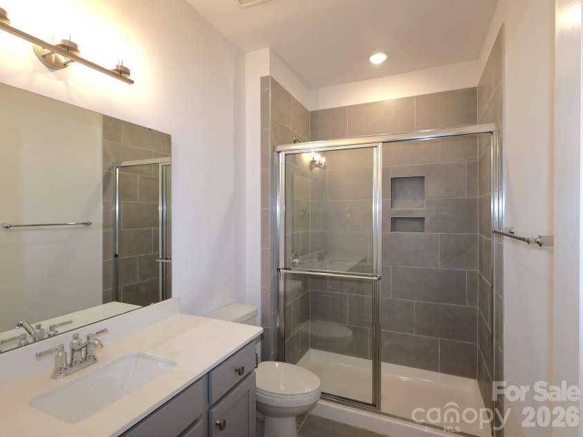 7124 Helmans Drive, Huntersville, NC 28078.  MLS# CAR4398705, YatesRealty ID 34001. First floor bathroom