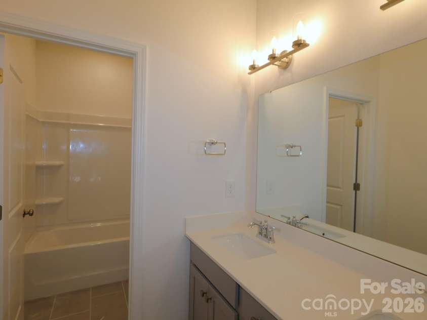 7124 Helmans Drive, Huntersville, NC 28078.  MLS# CAR4398705, YatesRealty ID 34001. Secondary bathroom