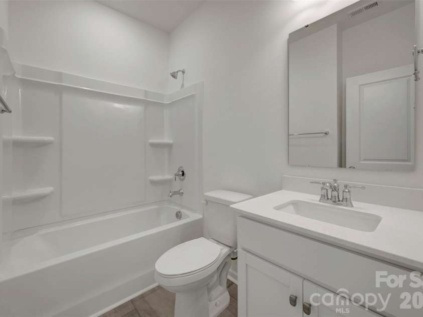 629 Willoughby Park Drive, Monroe, NC 28112.  MLS# CAR4398717, YatesRealty ID 34002. First floor bathroom