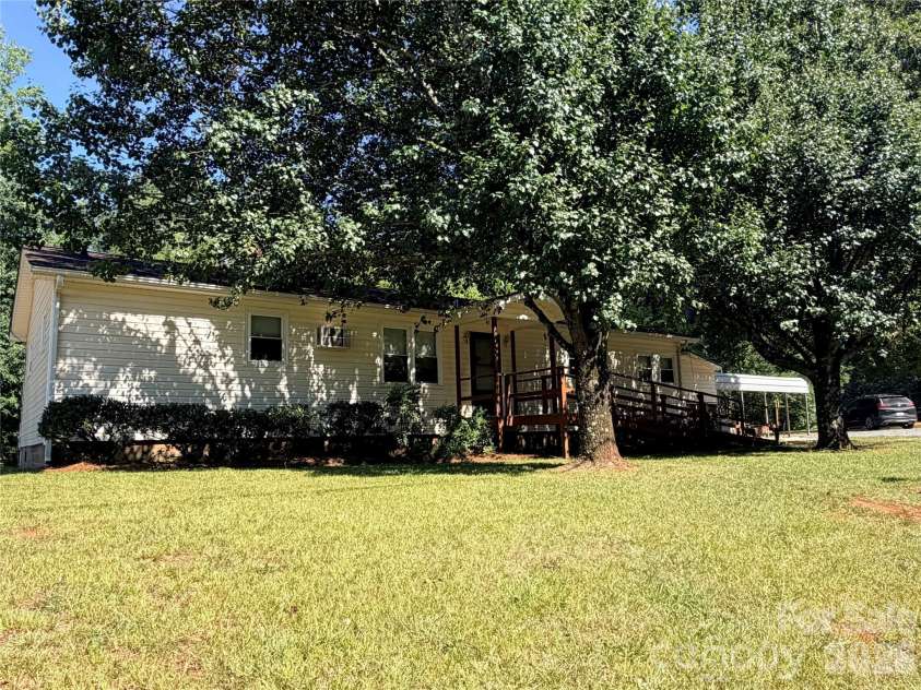 5945 Flowes Store Road, Concord, NC 28025.  MLS# CAR4398310, YatesRealty ID 34008. 