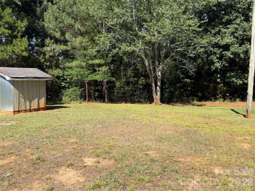 5945 Flowes Store Road, Concord, NC 28025.  MLS# CAR4398310, YatesRealty ID 34008. 