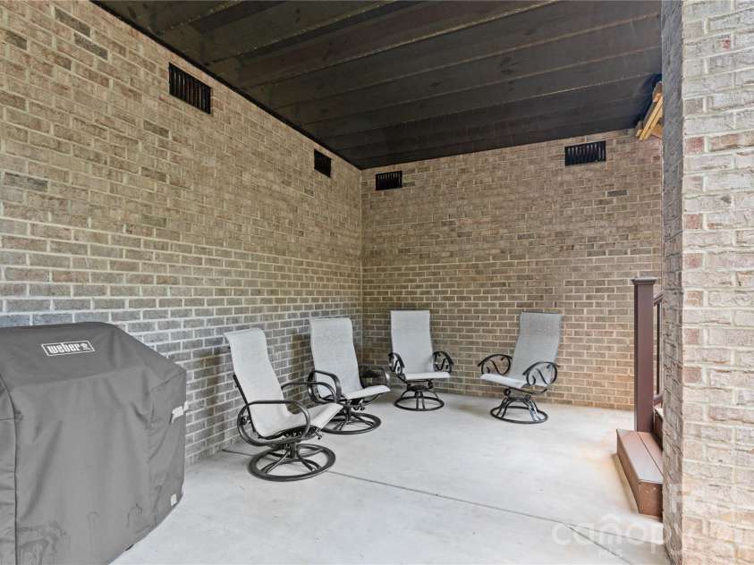 5106 Silver Trace Lane, Denver, NC 28037.  MLS# CAR4393759, YatesRealty ID 34012. Space underneath main floor porch.