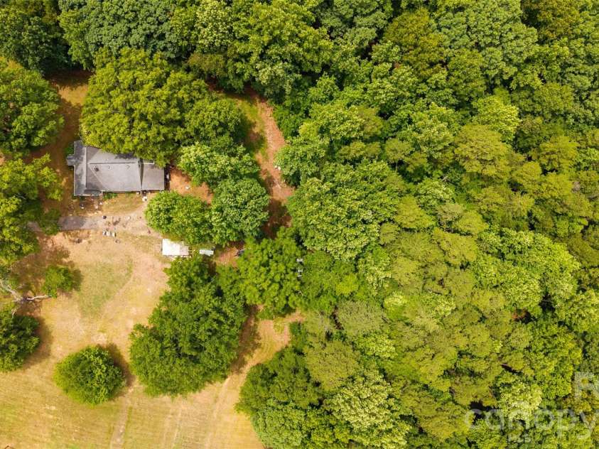 8628 Island Point Road, Sherrills Ford, NC 28673.  MLS# CAR4395855, YatesRealty ID 34013. 1940s house with shed on property
