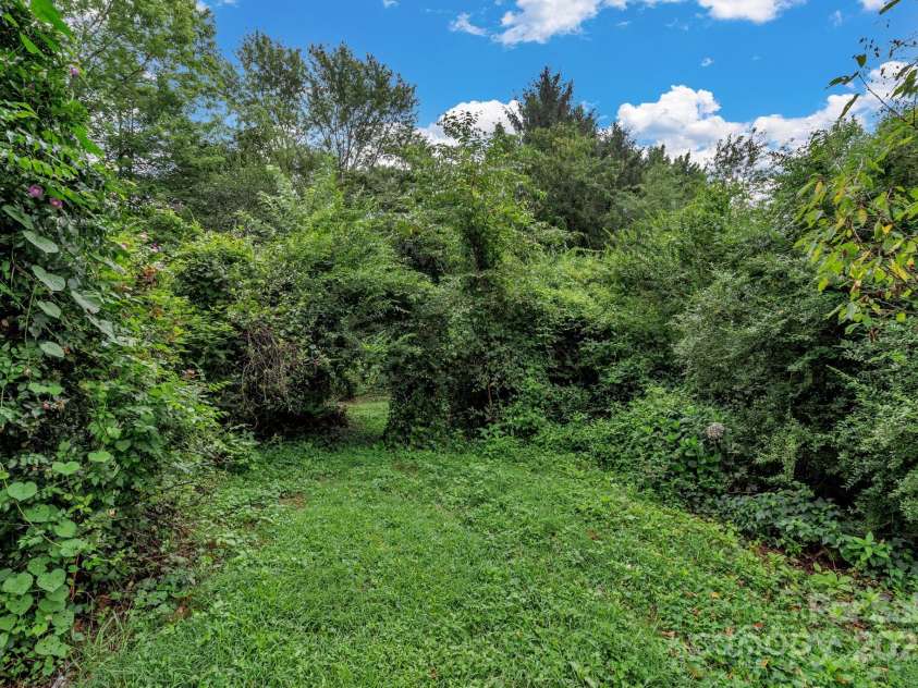 79 Gloria Orchard Lane, Hendersonville, NC 28792.  MLS# CAR4285410, YatesRealty ID 34014. Fairly level lot