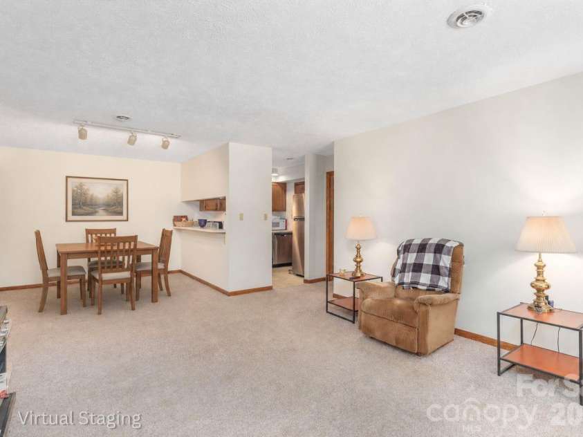 33 Ravencroft Lane, Asheville, NC 28803.  MLS# CAR4395761, YatesRealty ID 34017. Open Floor Plan - Living / Dining Area: Virtual Staging