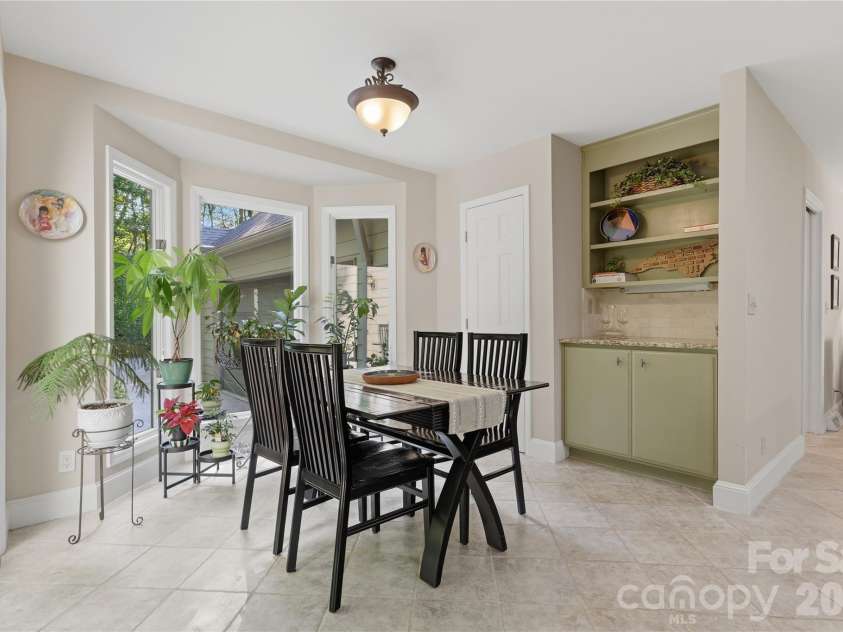2402 Beaucatcher Lane, Charlotte, NC 28270.  MLS# CAR4394384, YatesRealty ID 34019. Breakfast area with pantry & built in cabinet