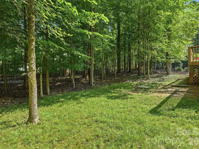 2402 Beaucatcher Lane, Charlotte, NC 28270.  MLS# CAR4394384, YatesRealty ID 34019. Wooded & private rear yard