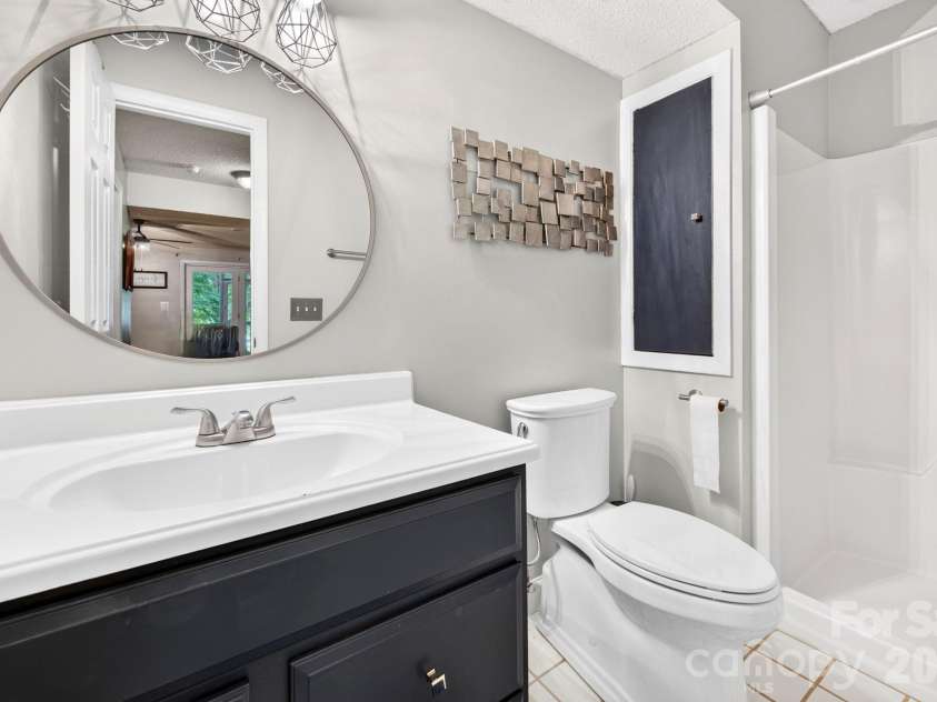 54 Hollybrook Drive, Asheville, NC 28803.  MLS# CAR4389385, YatesRealty ID 34027. Bathroom lower level