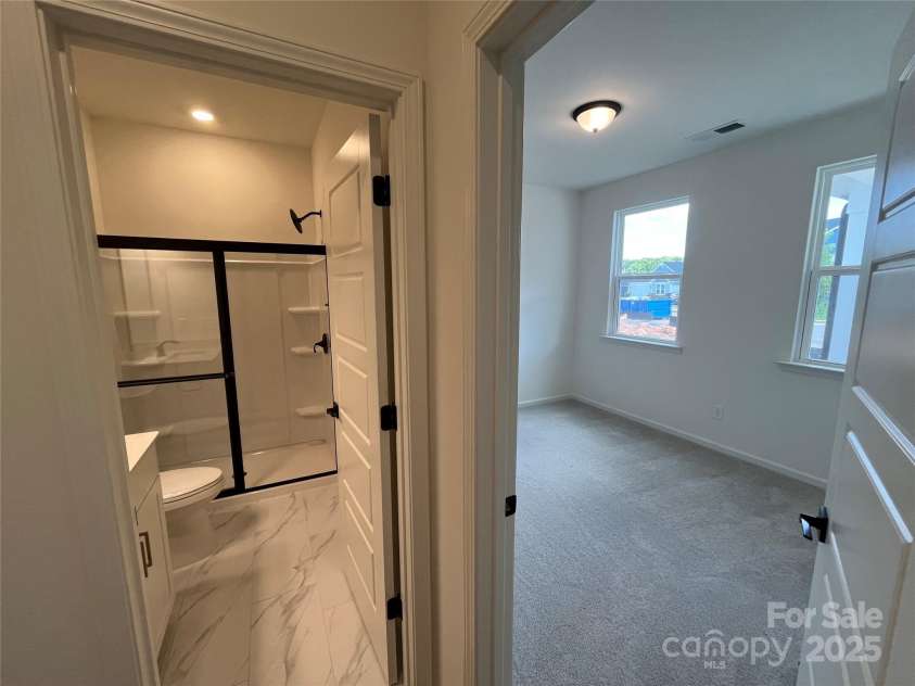 1005 Cunningham Farm Drive, Indian Trail, NC 28079.  MLS# CAR4258695, YatesRealty ID 34028. Downstairs Bedroom5 w/fullbath