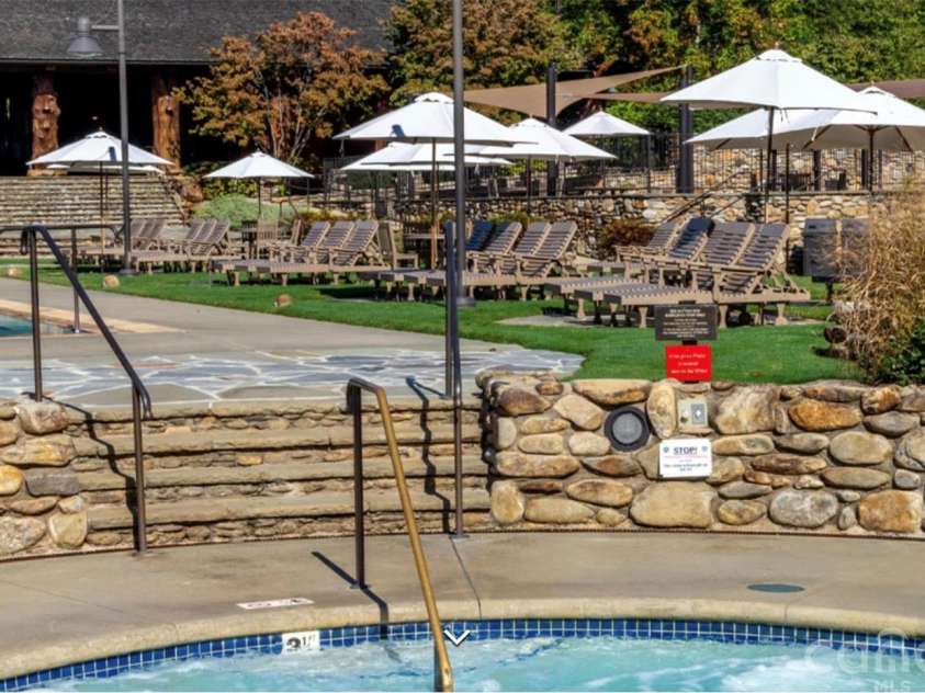 186 Fish Camp Drive, Nebo, NC 28761.  MLS# CAR4293027, YatesRealty ID 34040. Hot Tub and Pool at Camp Lake James