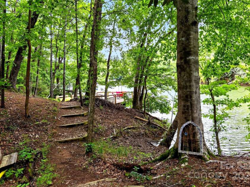 186 Fish Camp Drive, Nebo, NC 28761.  MLS# CAR4293027, YatesRealty ID 34040. Nice, easy walk to the lake!