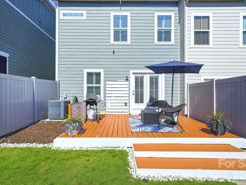 12701 Glowing Peak Road, Huntersville, NC 28078.  MLS# CAR4387999, YatesRealty ID 34041. Backyard Deck