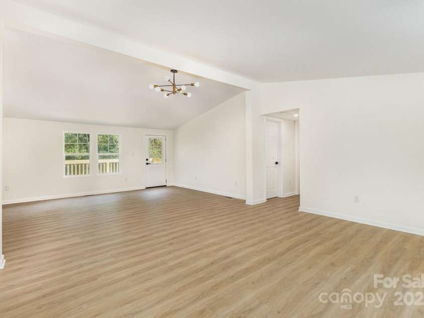 12180A Coyle Road, Stanfield, NC 28163.  MLS# CAR4294733, YatesRealty ID 34044. Dining Room with access to the rear deck and backyard