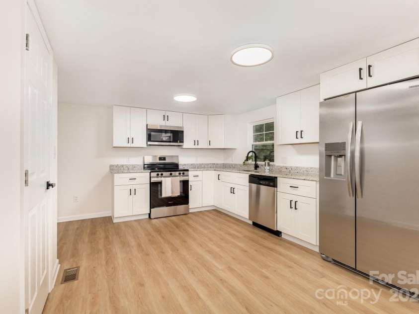 12180A Coyle Road, Stanfield, NC 28163.  MLS# CAR4294733, YatesRealty ID 34044. Fully remodeled kitchen with stainless appliances