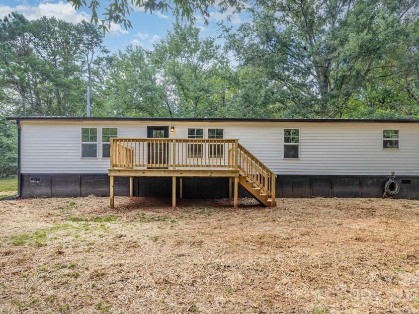 12180A Coyle Road, Stanfield, NC 28163.  MLS# CAR4294733, YatesRealty ID 34044. Rear deck and backyard