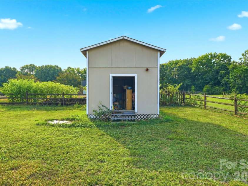 4705 Ceria Drive, Monroe, NC 28112.  MLS# CAR4398109, YatesRealty ID 34048. Storage Shed