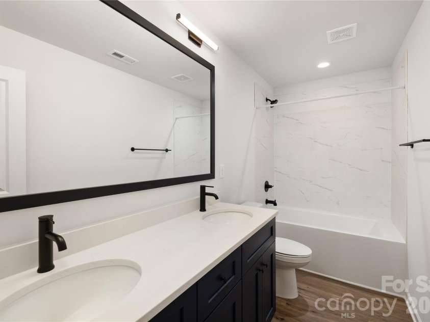 4257 Acorn Street, Charlotte, NC 28205.  MLS# CAR4337811, YatesRealty ID 3405. Representative Photo: Guest Bathroom Upper Level