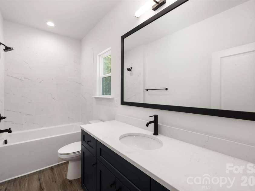 4257 Acorn Street, Charlotte, NC 28205.  MLS# CAR4337811, YatesRealty ID 3405. Representative Photo: Main Level Full Bathroom