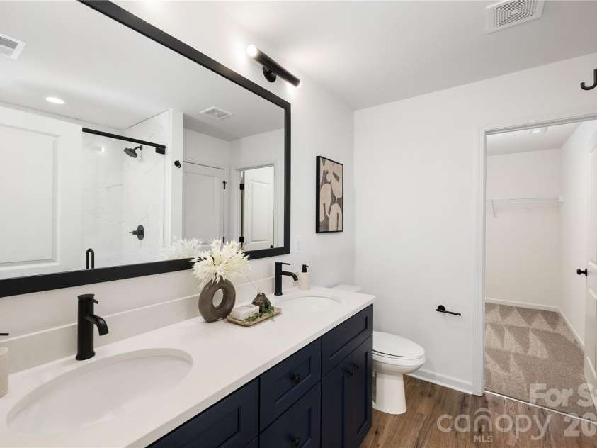 4257 Acorn Street, Charlotte, NC 28205.  MLS# CAR4337811, YatesRealty ID 3405. Representative Photo: Primary Bathroom