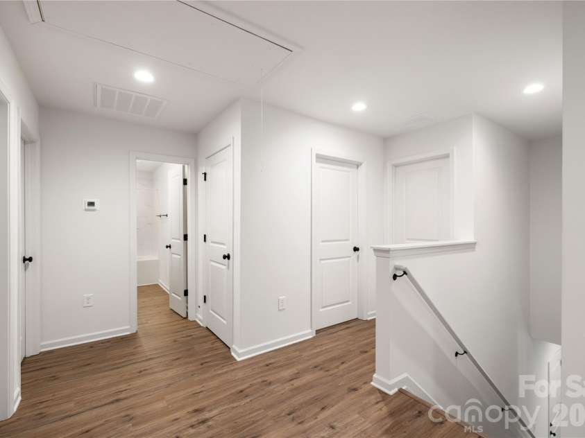 4257 Acorn Street, Charlotte, NC 28205.  MLS# CAR4337811, YatesRealty ID 3405. Representative Photo: Upper Level Hallway