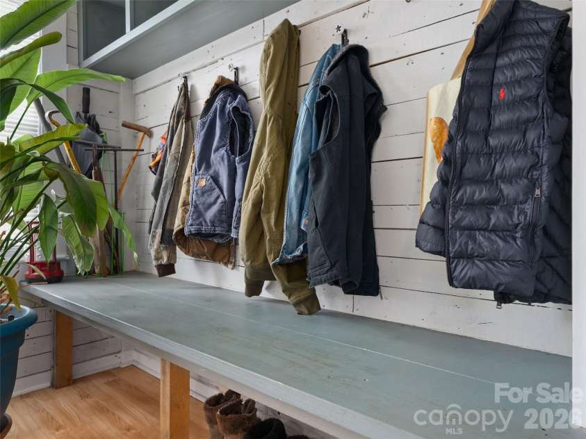 15 Craig Circle, Asheville, NC 28805.  MLS# CAR4395513, YatesRealty ID 34050. Custom barnwood wall and bench