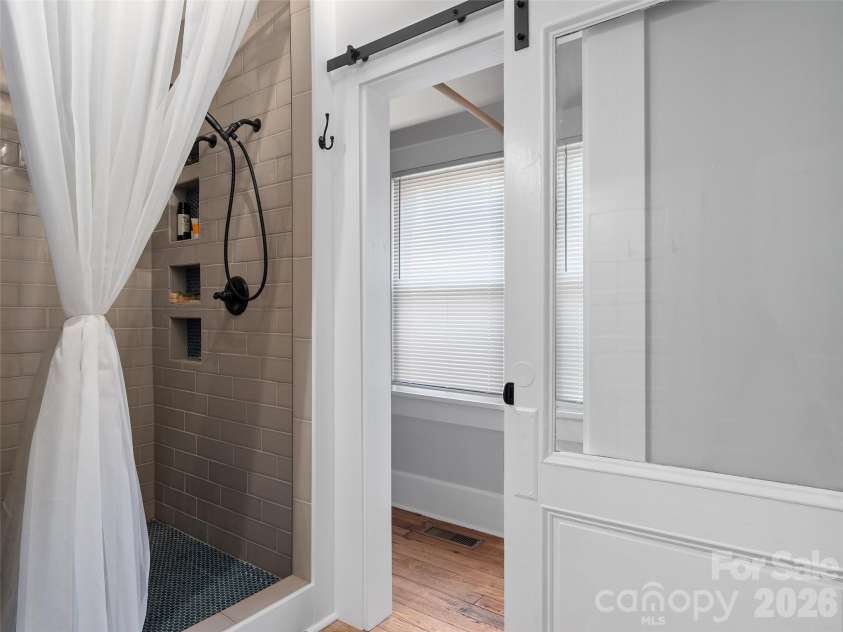 15 Craig Circle, Asheville, NC 28805.  MLS# CAR4395513, YatesRealty ID 34050. Fully tiled walk-in shower and huge closet
