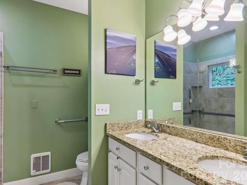 54 Victoria Park Drive, Hendersonville, NC 28792.  MLS# CAR4396102, YatesRealty ID 34053. Primary bath