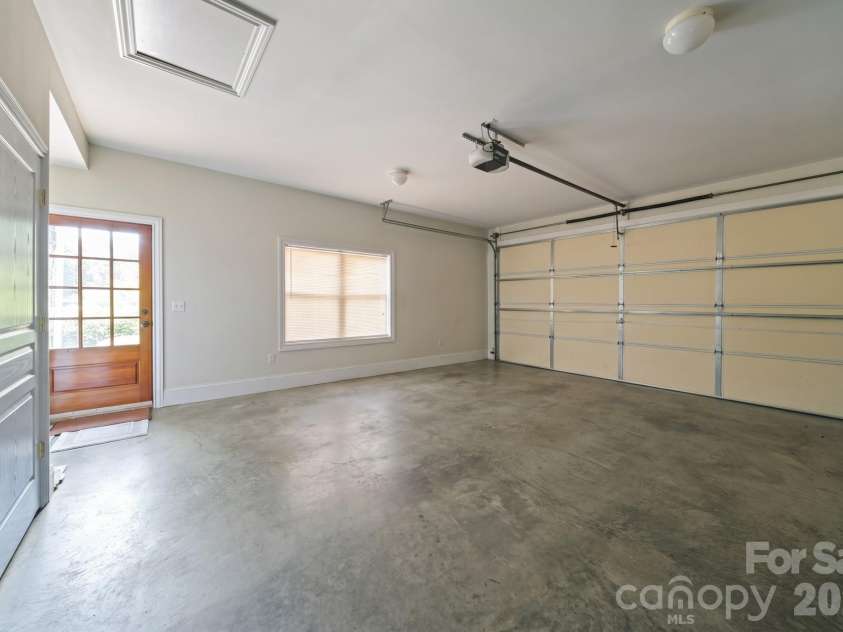 195 Oak Lane, Mars Hill, NC 28754.  MLS# CAR4394018, YatesRealty ID 34054. 2 car garage with separate entrance