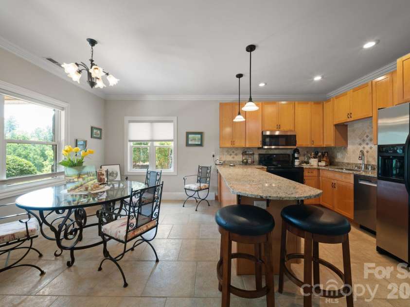 195 Oak Lane, Mars Hill, NC 28754.  MLS# CAR4394018, YatesRealty ID 34054. Dining room and kitchen
