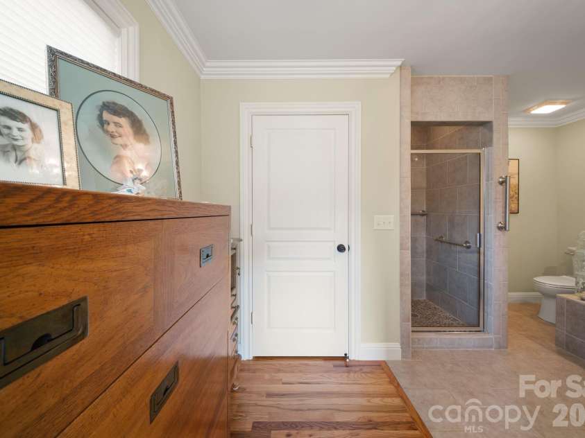 195 Oak Lane, Mars Hill, NC 28754.  MLS# CAR4394018, YatesRealty ID 34054. Primary bedroom with large walkin closet