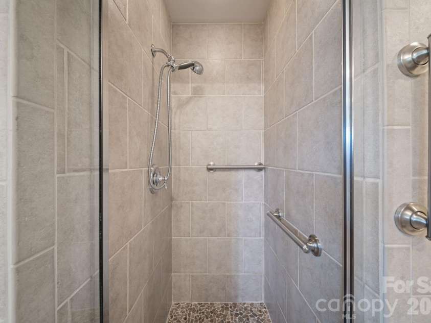 195 Oak Lane, Mars Hill, NC 28754.  MLS# CAR4394018, YatesRealty ID 34054. Primary walk in tile shower