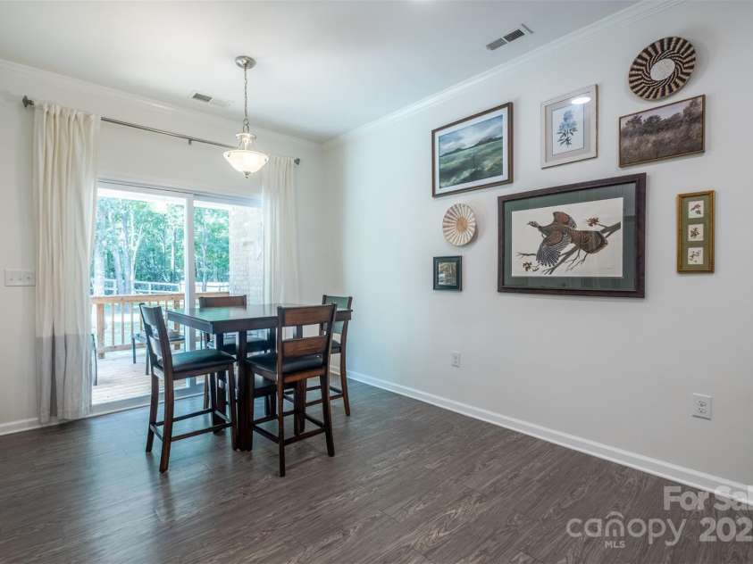 114 Keowee Circle, Indian Trail, NC 28079.  MLS# CAR4280462, YatesRealty ID 34056. Dining Area with Sliding Door to Covered Deck