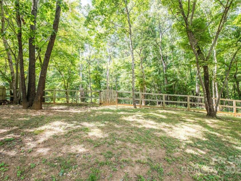 114 Keowee Circle, Indian Trail, NC 28079.  MLS# CAR4280462, YatesRealty ID 34056. Fenced Back Yard with Mature Shade Trees