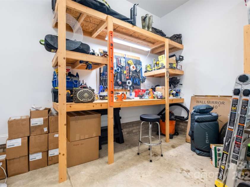 114 Keowee Circle, Indian Trail, NC 28079.  MLS# CAR4280462, YatesRealty ID 34056. Workbench in the Garage