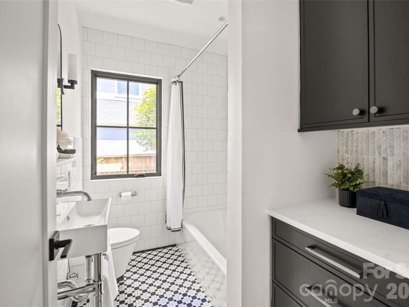 2509 Belvedere Avenue, Charlotte, NC 28205.  MLS# CAR4396989, YatesRealty ID 34057. Hall Bath with Original 1940's Tile