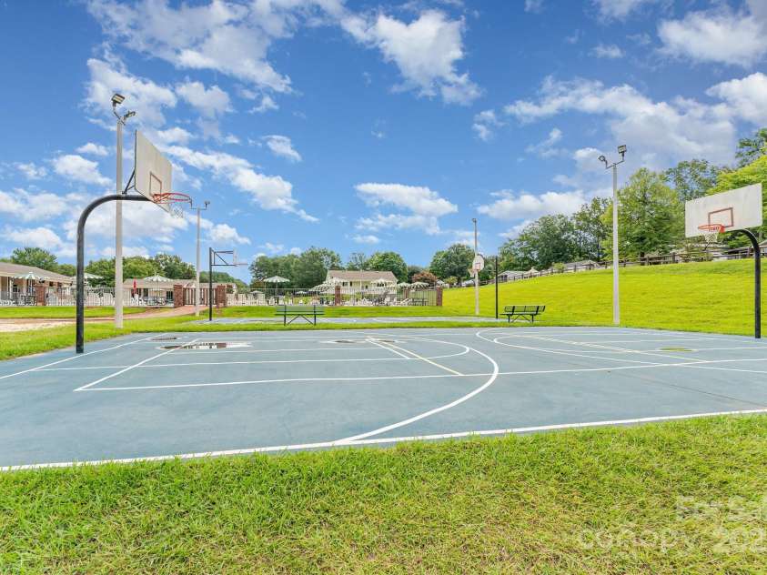 115 Trails End Lane, New London, NC 28127.  MLS# CAR4281214, YatesRealty ID 34059. Basketball and pickleball courts