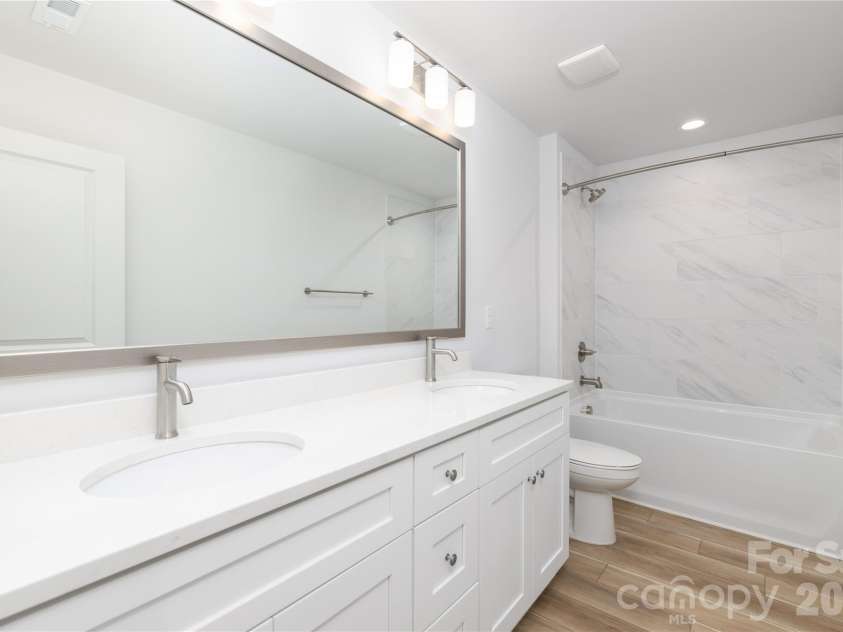 4251 Acorn Street, Charlotte, NC 28205.  MLS# CAR4335264, YatesRealty ID 3406. Representative Photo: Guest Bathroom