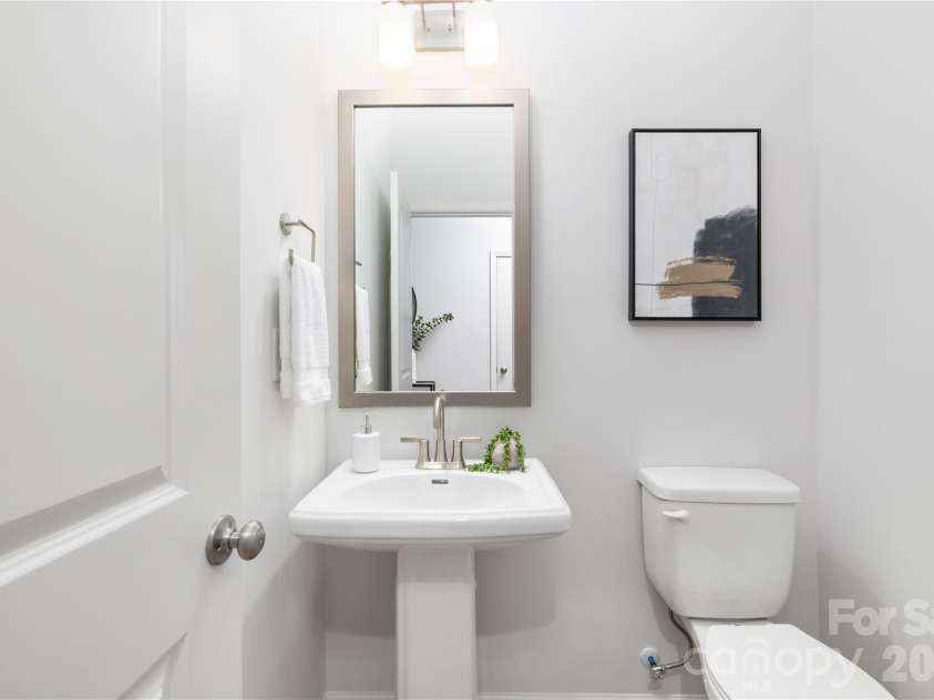 4251 Acorn Street, Charlotte, NC 28205.  MLS# CAR4335264, YatesRealty ID 3406. Representative Photo: Half Bathroom Downstairs